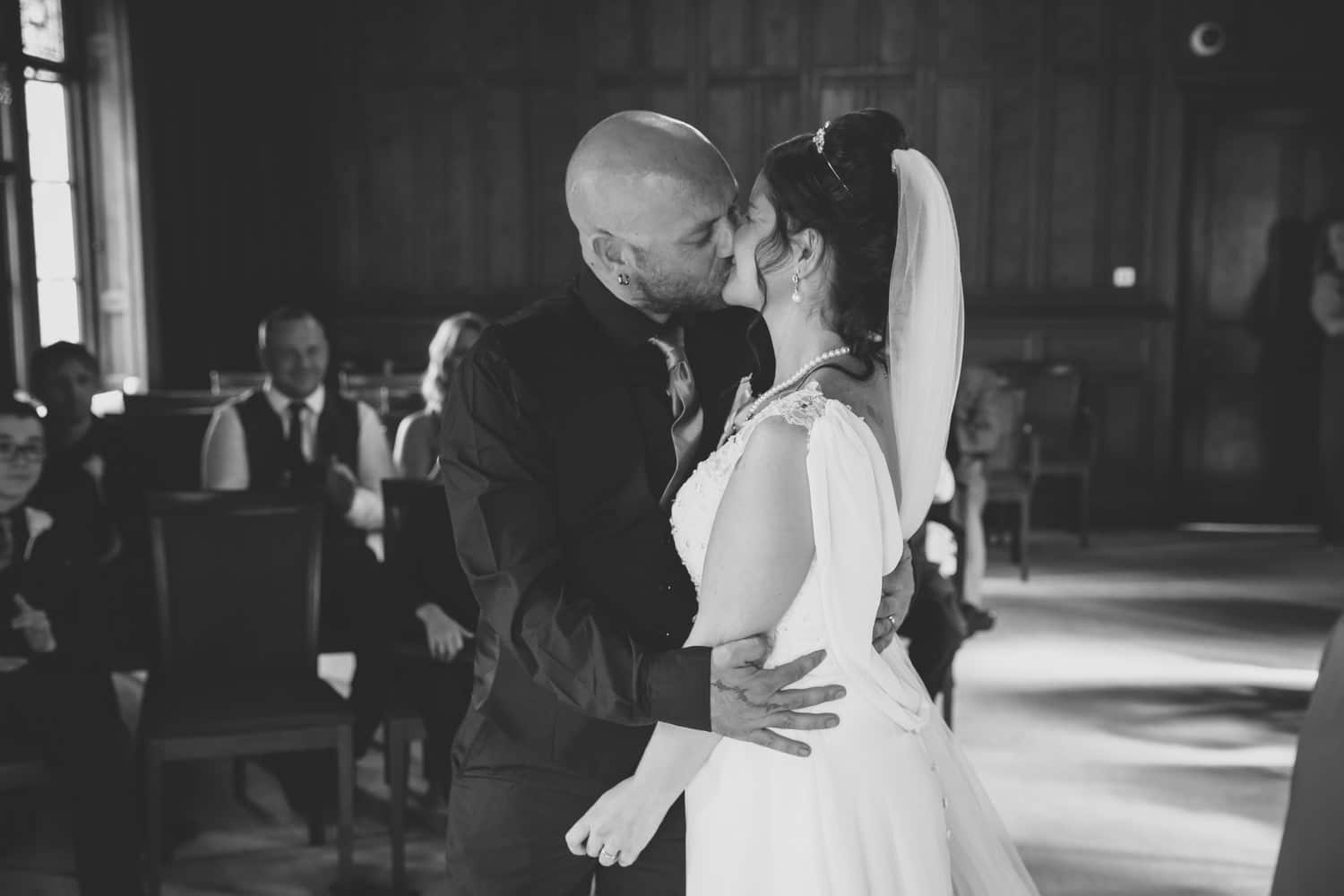 Bride and Groom kissing at Carlisle Registry Office