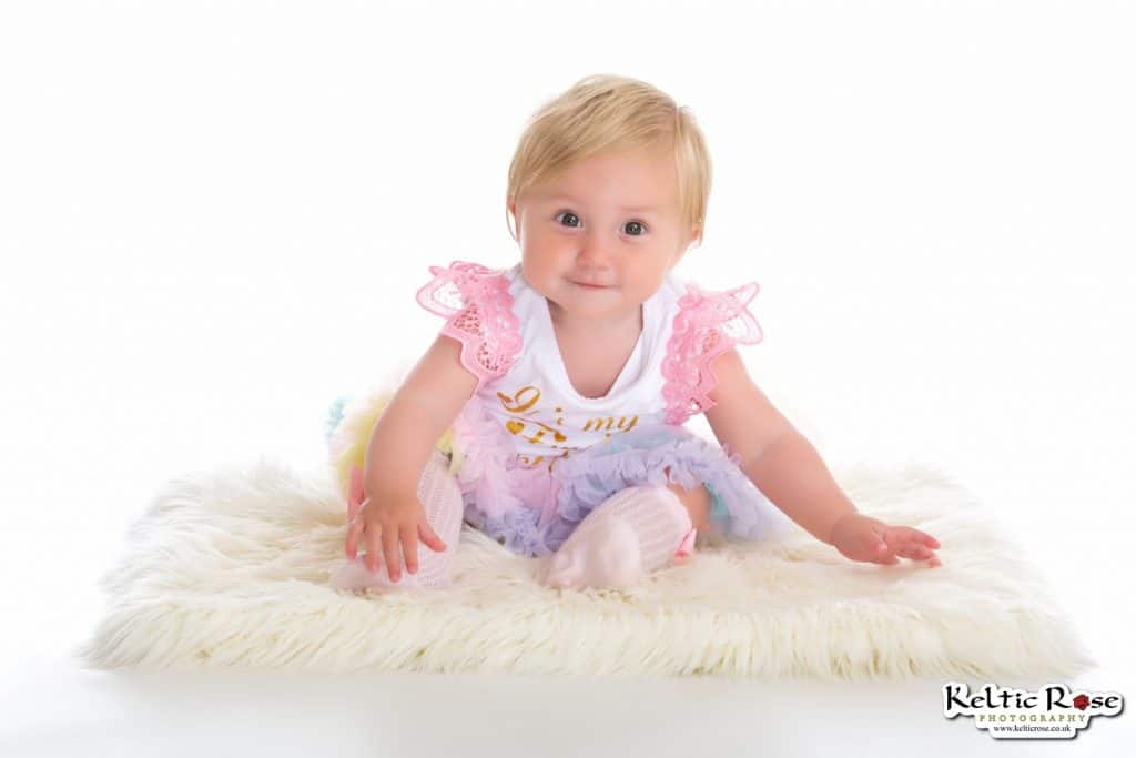 Little girl on a white background