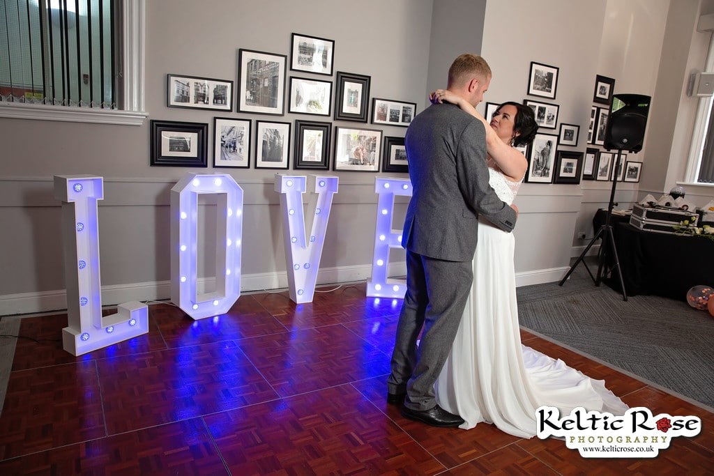 Bride and Groom dancing to their first dance at Tullie House Museum and Art Gallery